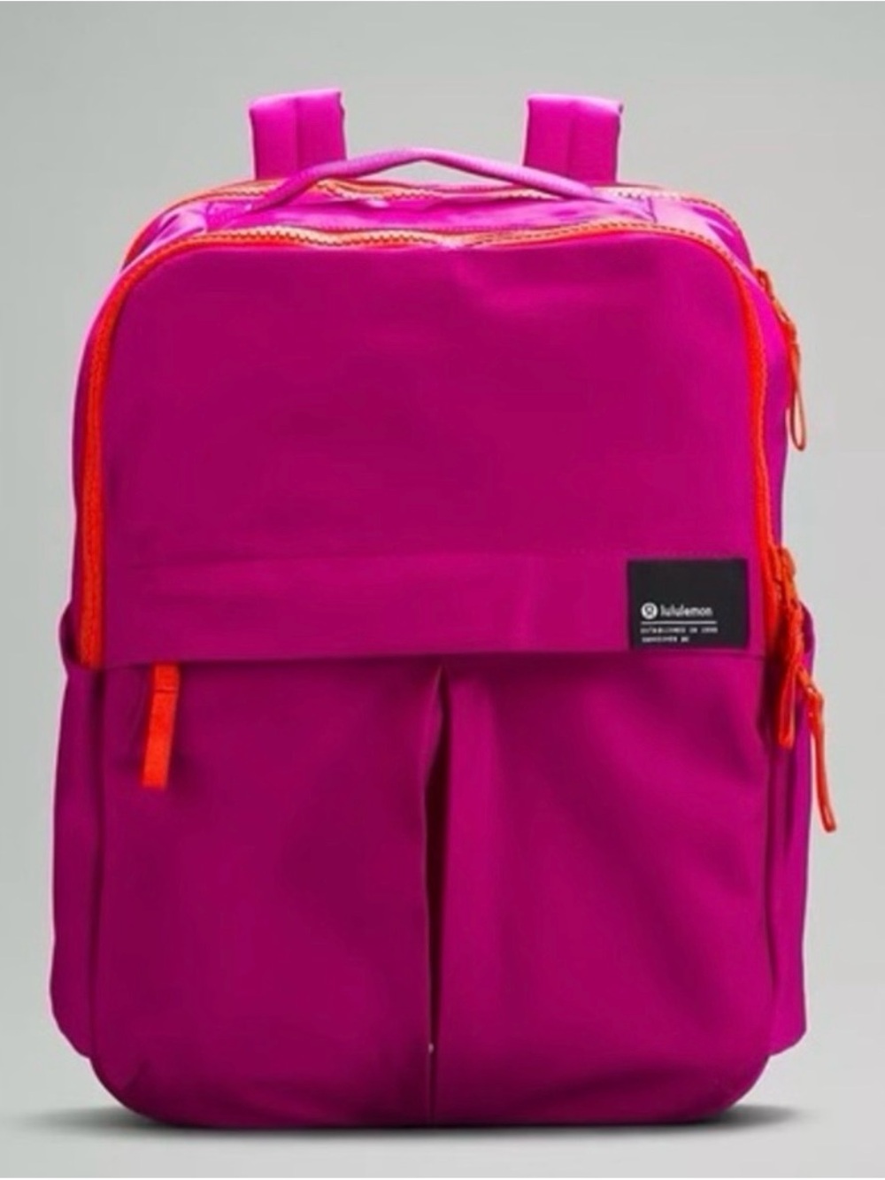 lululemon athletica Bright Magenta Backpack with Orange Trim